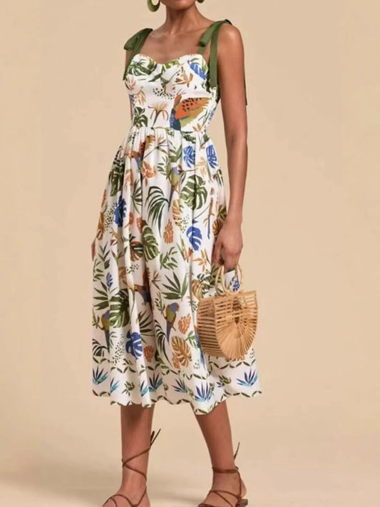 Vestido midi tropical con escote corazón y tirantes anudados al hombro